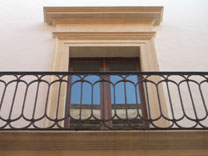Balcony (over cobbled streets)