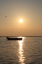 Boat at sunset in Porto Cesareo